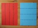 vouw de twee vellen papier in vier gelijke delen, zoals aangegeven op de foto