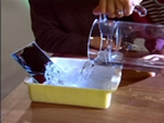 vul het teiltje met water
