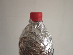 zorg dat er geen aluminiumfolie over de dop zit