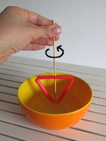 draai de prikker met het rietje met je hand